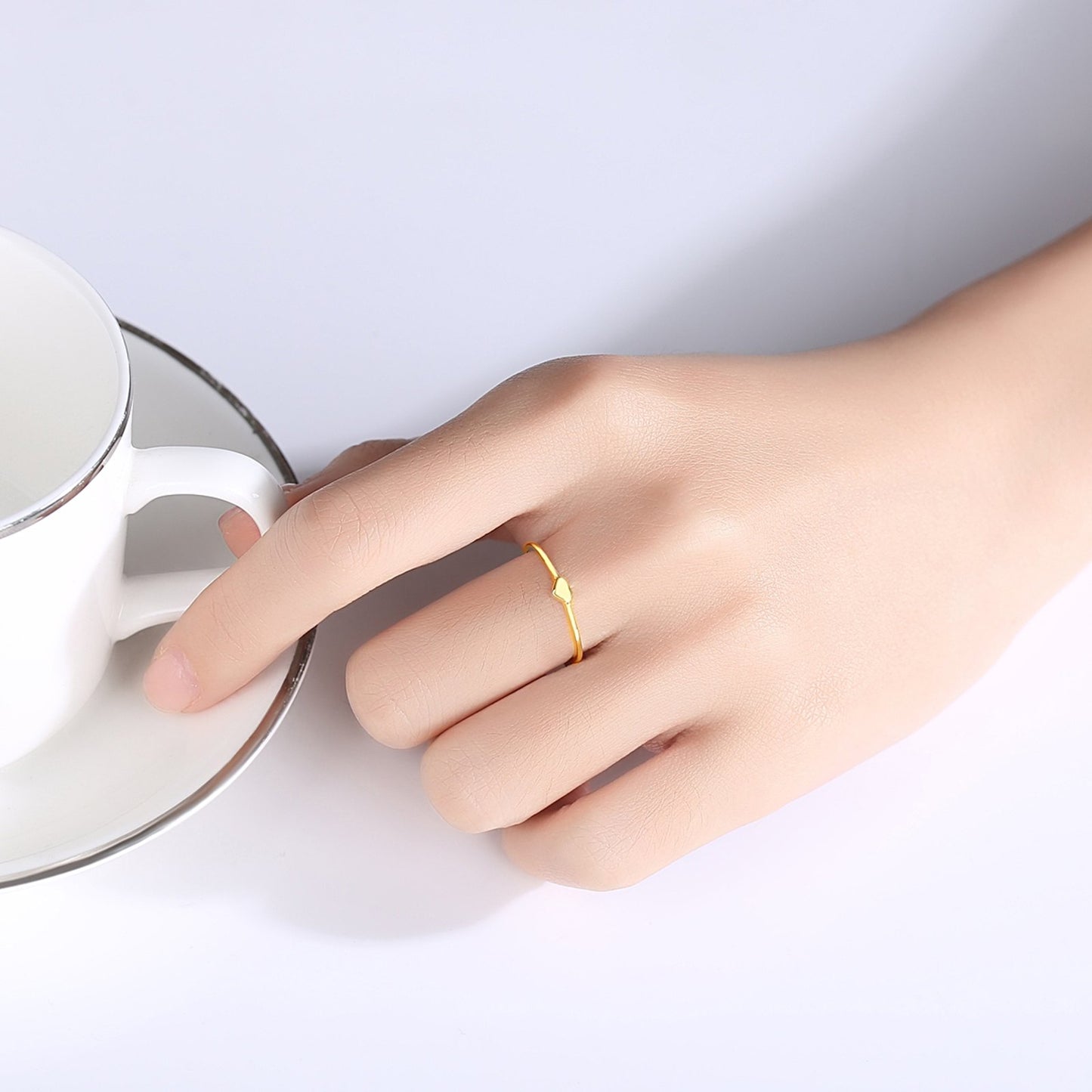 Inel din argint placat cu aur model inima cesini purtat