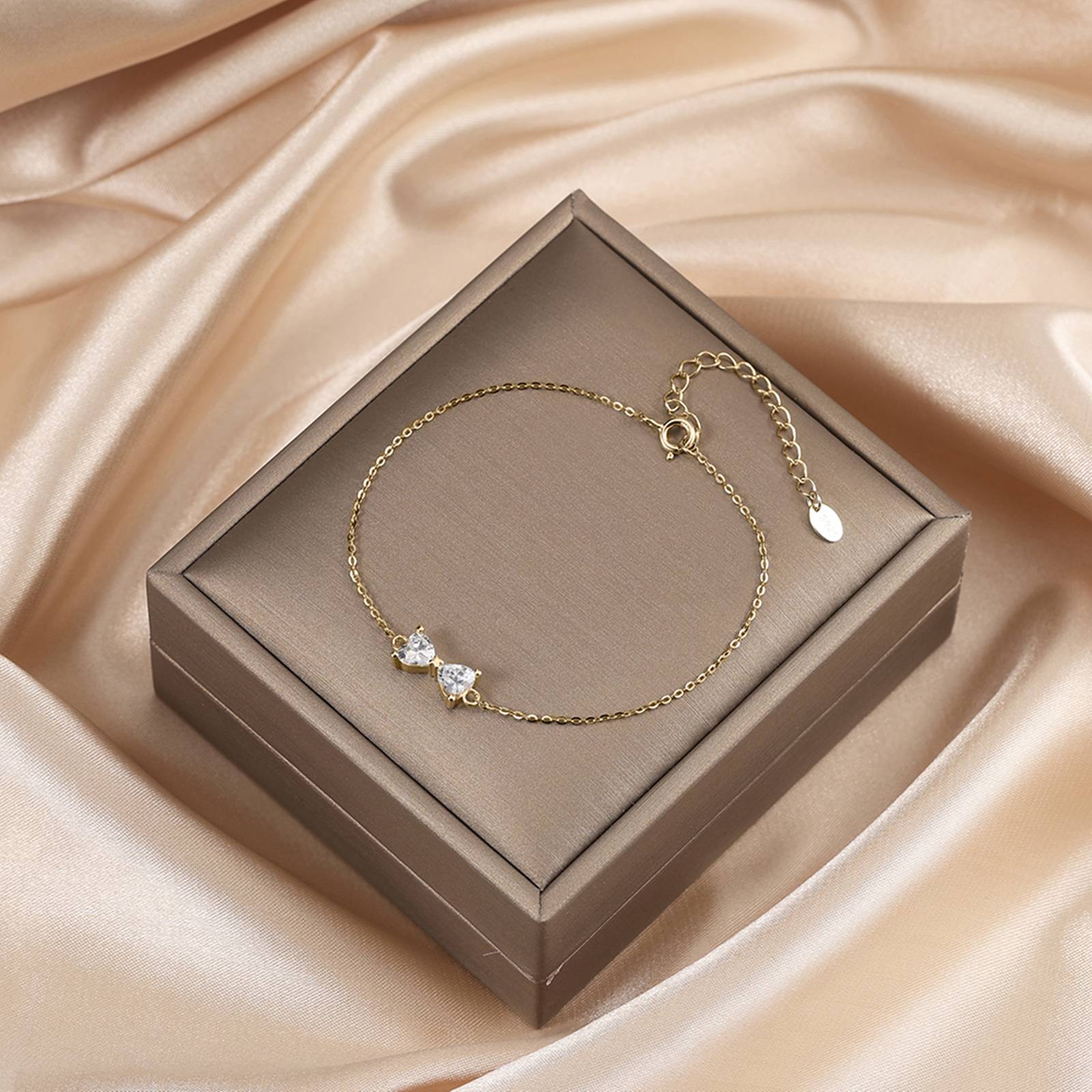 Bratara din argint placata cu aur cu fundita si zirconiu eleganta cesini cadou