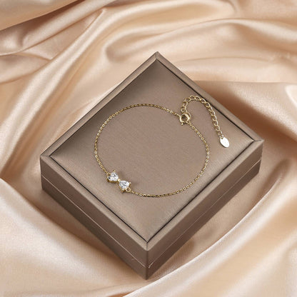 Bratara din argint placata cu aur cu fundita si zirconiu eleganta cesini cadou