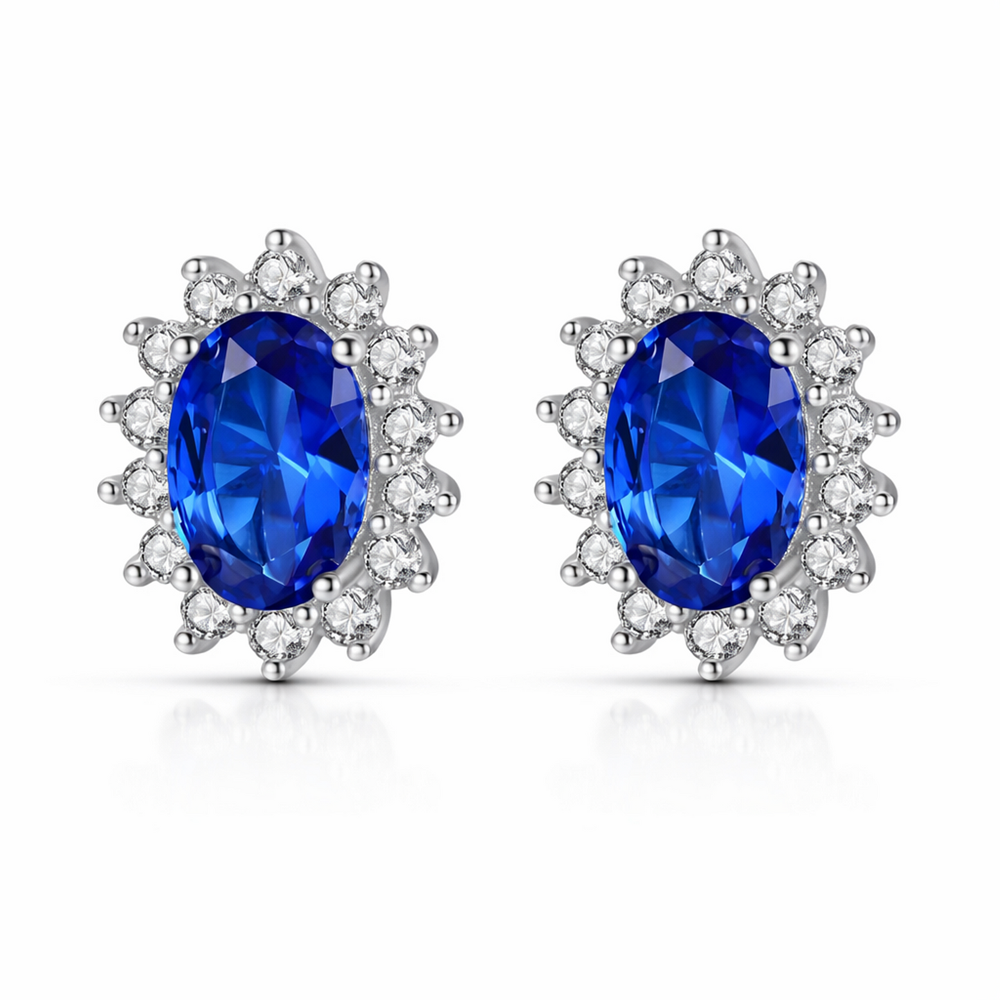 Cercei din argint rotunzi eleganti cu safir albastru si zirconiu cesini