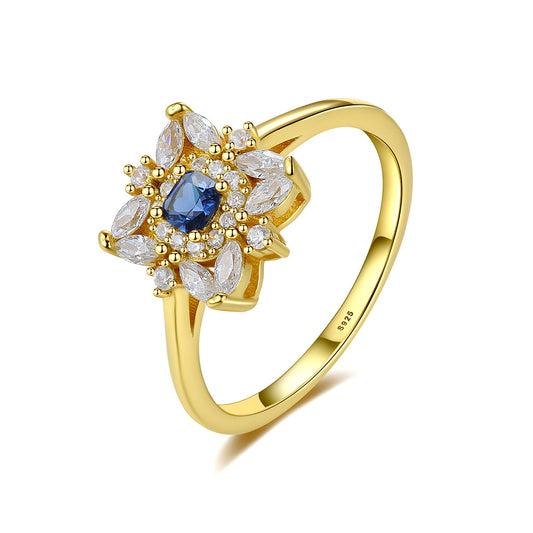 Inel din argint elegant placat cu aur cu safir albastru si cristale zirconiu cesini