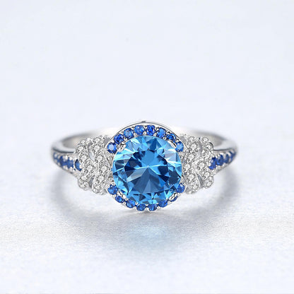 Inel din argint elegant rotund cu safir albastru si cristale zirconiu cesini cadou