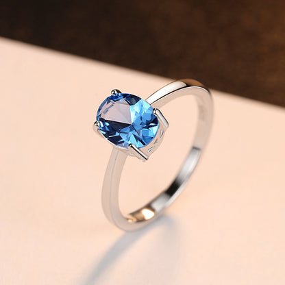 Inel din argint elegant oval cu topaz albastru cesini femei