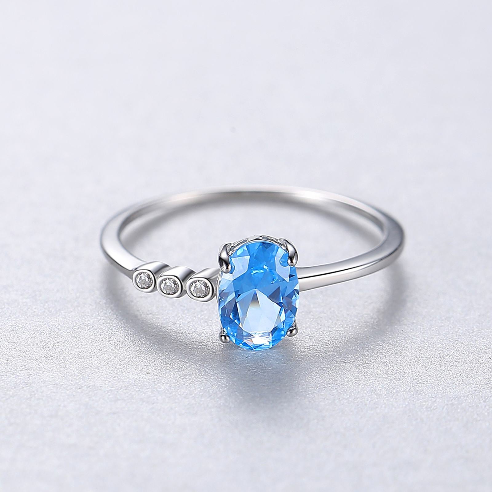 Inel din argint cu topaz albastru si cristale zirconiu cesini femei