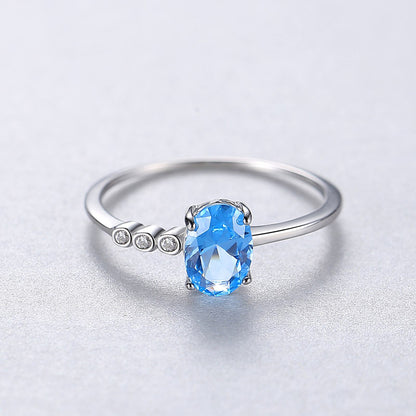 Inel din argint cu topaz albastru si cristale zirconiu cesini femei