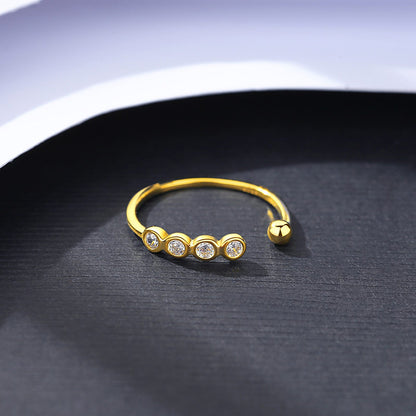 Inel din argint reglabil placat cu aur cu cristale zirconiu si biluta cesini femei