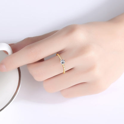 Inel din argint placat cu aur cu cristale zirconiu cesini purtat